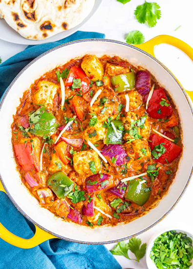 Biryani paneer curries and naan in North Indian catering service